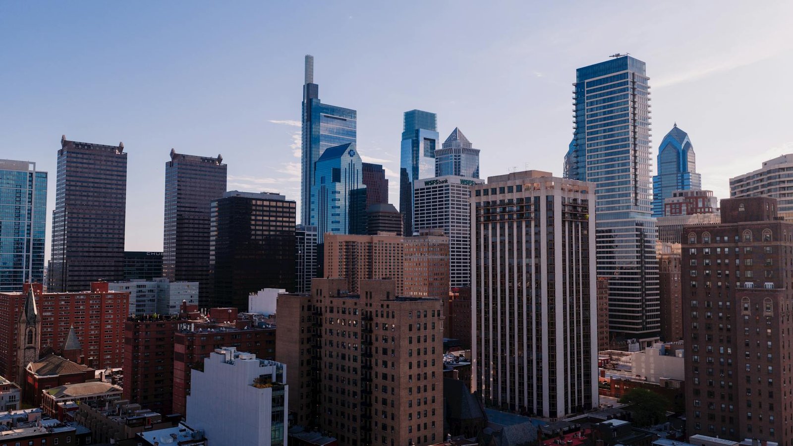 Stunning aerial view of Philadelphia skyline showcasing modern skyscrapers on a clear day.